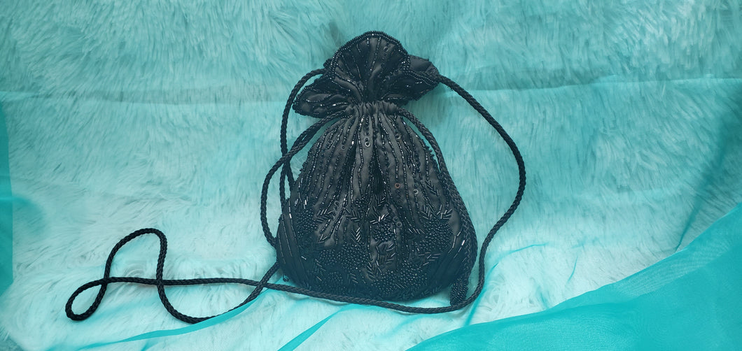 Black drawstring clutch