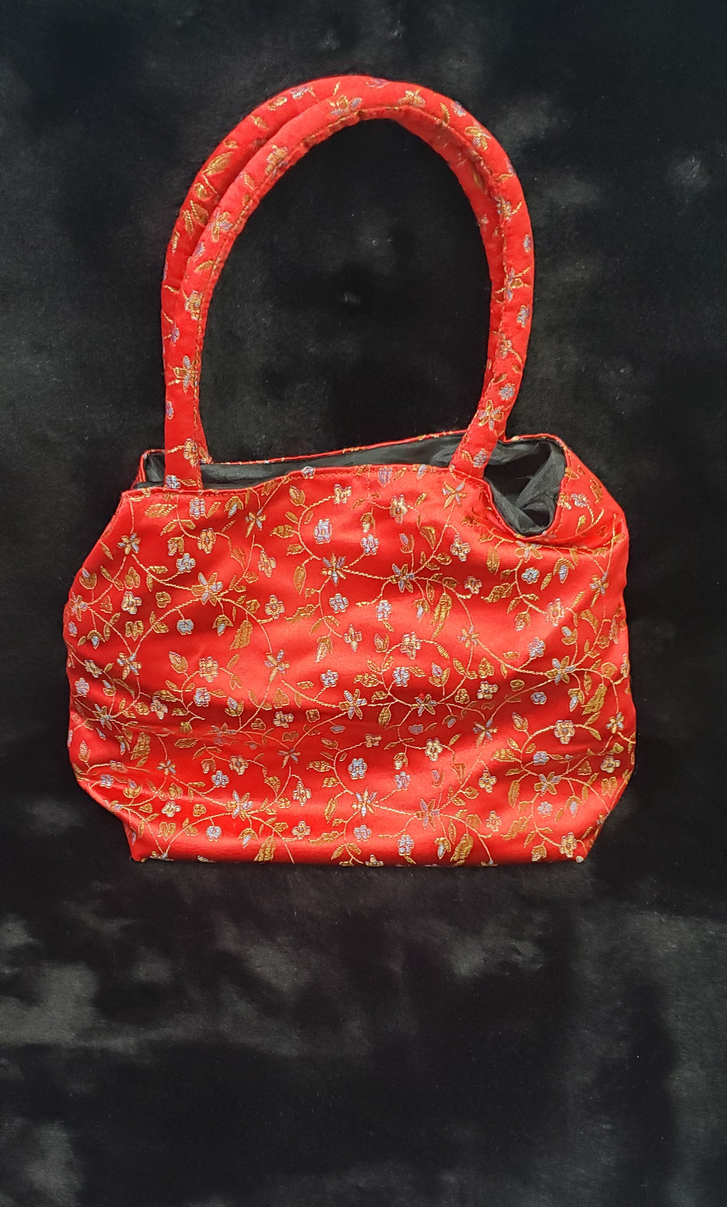 Red fabric handbag